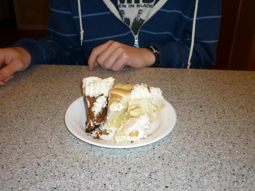 There was actually a third pie (Grandma gave Alan a chocolate satin pie in honor of Pi Day -- 3.14), so Elliot had to sample all three. He believes in taking advantage of every privilege he can claim by being the birthday boy.