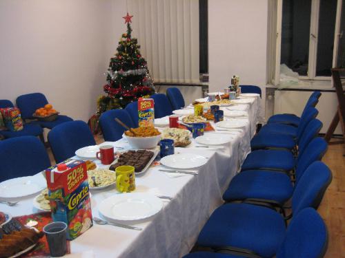 The table is set for a Christmas meal with the members in Poznan