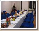 The table is set for a Christmas meal with the members in Poznan