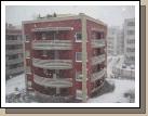 View of a snowy day from Tess's apartment in Poznan.