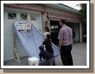 The first grade had an Invention Convention.  Clark decided we needed to figure out how to make a ball return for the backboard I picked up at DI for $12.