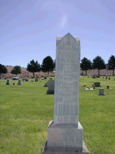 Here we are in the Moroni Cemetery, at the marker of Daniel H. Cook and Emmeline Draper Cook, my great-great-grandparents.