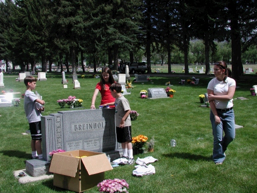 The kids helped us clean up the headstones and water the flowers.