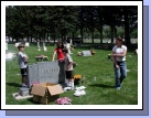 The kids helped us clean up the headstones and water the flowers.