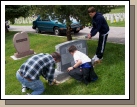 The birds always seem to like my parent's headstone -- gives the kids something to do while Alan attacks the grass.