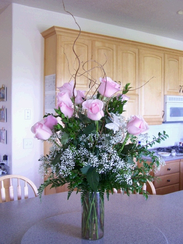 A couple that has taught Tess in Sunday School and Young Women wasn't able to attend, but sent her a good luck bouquet of roses the day of the recital -- wow, it was stunning.