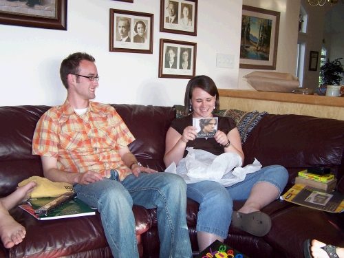 Having fun opening presents together.