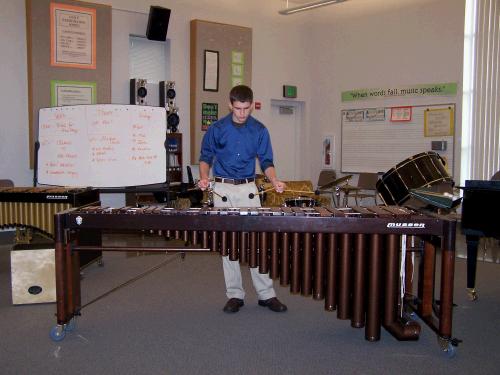 Elliot performing his solo at the percussion recital.
