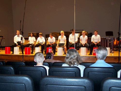 At the Percussion Concert, the 6th and 7th graders did a "bucket" piece.  It's kind of like a drum line only using buckets instead! 