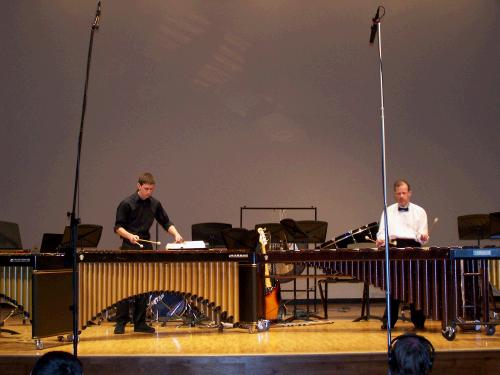 Elliot performing with his teacher Dan Chamberland.