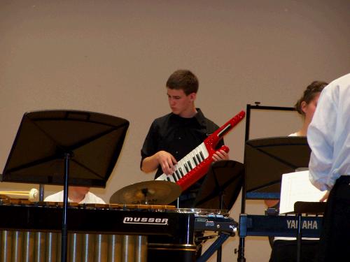 As a percussionist, you get an opportunity to play several kinds of instruments.  This cool thing Elliot is playing is called a "keytar".