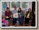 The happy couple opening their gifts with a proud mama on each side.  Anne's wonderful mother is Carol Bogue.