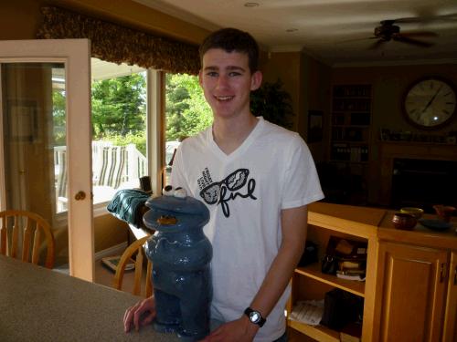 A random picture of Elliot with the Cookie Monster cookie jar that he made in his ceramics class at school.  You wouldn't believe how much it weighs!