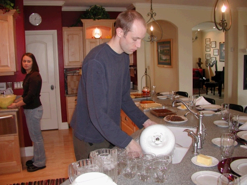 Jared (Melinda's husband) already washing dishes and we haven't even eaten yet!