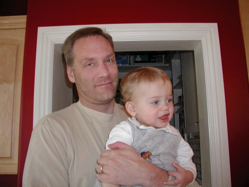 Mark (my brother) holding their little Andrew.