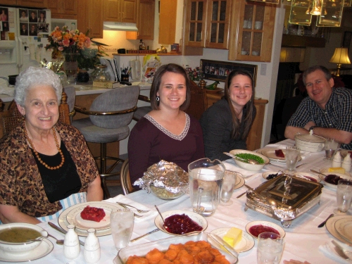 All ready for dinner -- Grandma, Tess, Madeleine and Alan.