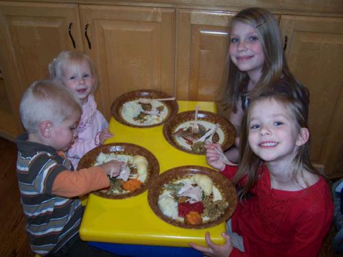 L-R Jackson Crapo, Annalisa Israelsen, Briana Hulme, and Karen Crapo enjoying dinner at the little guys table.... Briana is actually a big girl volunteering to help the little guys, which we really appreciated!