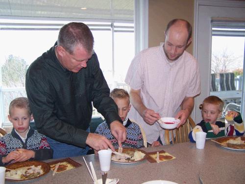 Brian Israelsen and Jared Crapo helping Andrew and Benjamin Israelsen and Andrew Morgan.