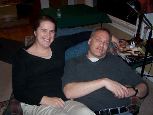 Cherry and Mark trying to get comfortable on the same chair after a big dinner.