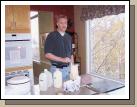 Mark mixing up the annual Thanksgiving perfect egg nog concoction.