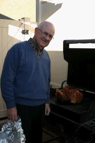 Grandpa has perfected the barbequed turkey...