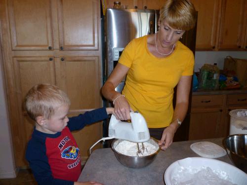 Two year old Daniel Crapo has a complete and total fetish for anything with a cord that plugs in.  He came running when he heard the beaters start up and Melinda decided to let him help whip the cream for the fruit salad.