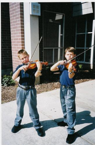 Elliot with his good friend Ryan Brinkerhoff.  Of course they didn't really play outside - the teacher was kind enough to take pictures of all the kids and send them with a card of congratulations.