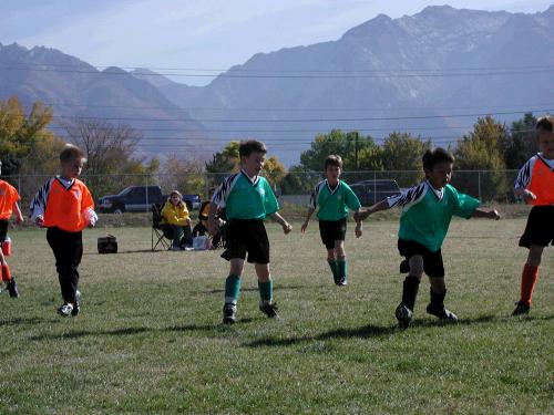 Clark's team is called The Green Dragons.  They actually have a couple of brothers from Mexico that are really good little soccer players.  So, our little team did quite well overall.