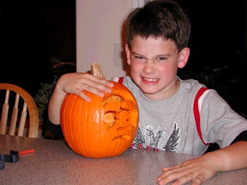 Clark with his ghoul face pumpkin.