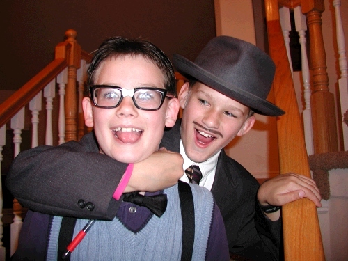 Clark is wearing an actual old pair of Alan's glasses.  Does that mean Alan was a nerd?  Oh, I mean, doesn't Clark look really smart in those glasses -- just like his Dad?