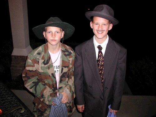 Elliot at the door with his friend Daniel (who by the way will never smile.)