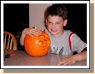 Clark with his ghoul face pumpkin.