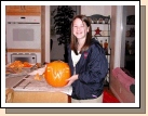 Madeleine with her Weezer rock group pumpkin.