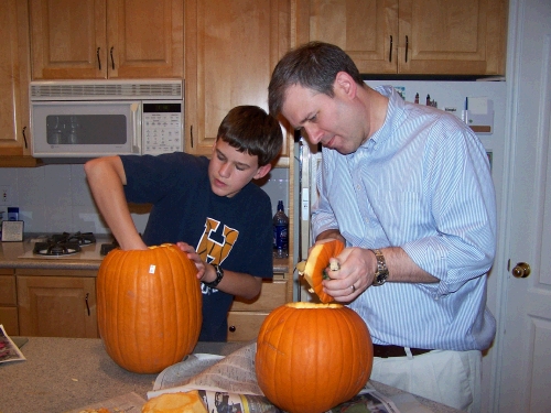 As the kids get older, it has been fun to have them carve their own pumpkins.  Dad is always willing to scoop the goop though!