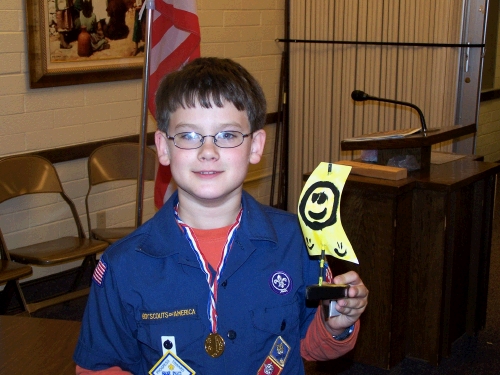 This year the Cub Scouts did the Rain Gutter Regatta.  Clark had a great time blowing his boat down the gutter full of water -- he won a few and lost a few.  That's life, right?