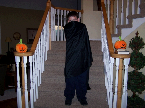 Clark, the "cloaked figure."