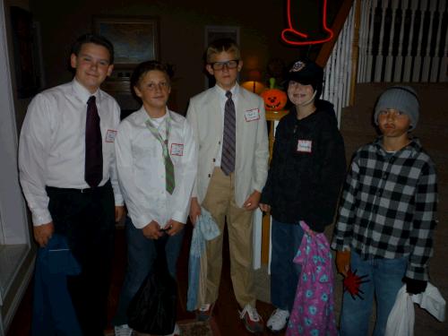 Clark and his friends all decided to dress up as various characters in the popular TV show, "The Office."  Clark was Michael Scott, Harrison Waddoups was Jim Halpert and Grant Valentine was Dwight Schrute.  Nicholas Stewart was an Arby's commercial and Noah Valentine on the right, was the bum trick or treating with his brother and friends.