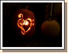 Clark's music teachers would be so proud...he obviously loves music!  Notice the cool white pumpkin on the right?