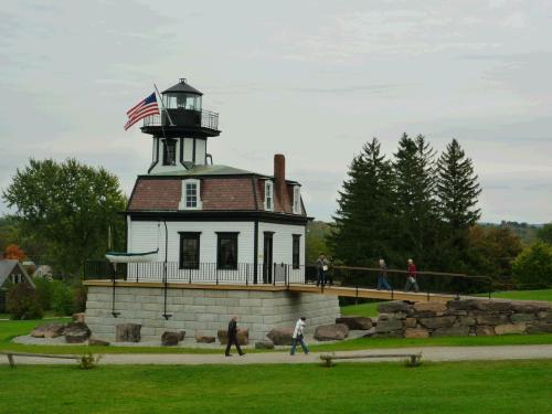 This lighthouse, from Colchester Reef on nearby Lake Champlain, served as home and workplace for 11 successive lighthouse keepers and their families. It was built in 1871.  In 1952, the abandoned Lighthouse was dismantled from its site on the lake and re-constructed at the Museum, where it sits near the 220-foot steamboat Ticonderoga, and is now housing a collection of original art by Warren Kimball.