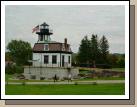 This lighthouse, from Colchester Reef on nearby Lake Champlain, served as home and workplace for 11 successive lighthouse keepers and their families. It was built in 1871.  In 1952, the abandoned Lighthouse was dismantled from its site on the lake and re-constructed at the Museum, where it sits near the 220-foot steamboat Ticonderoga, and is now housing a collection of original art by Warren Kimball.