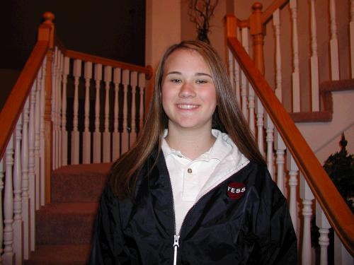 Tess sporting her new volleyball jacket on her way to early morning seminary.