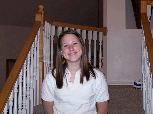 Madeleine on her first day of school -- heading off to her first day of Seminary.  That is actually a pretend smile because she wasn't really all that thrilled to get up so early!