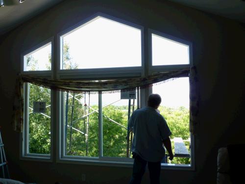 New windows for our bedroom.  At this moment the top three windows and the lower right window are empty.  Good thing we had nice weather that day!